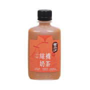 Less-sugar milk tea bottle with black cap and front orange label
