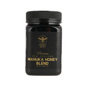 MANUKA SOUTH Manuka Honey Blend 500g jar, black bottle with gold logo and cap