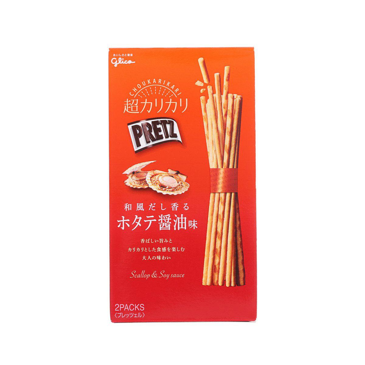 Pack of pretz-style scallop soy sauce biscuit sticks, orange bag with stick photo