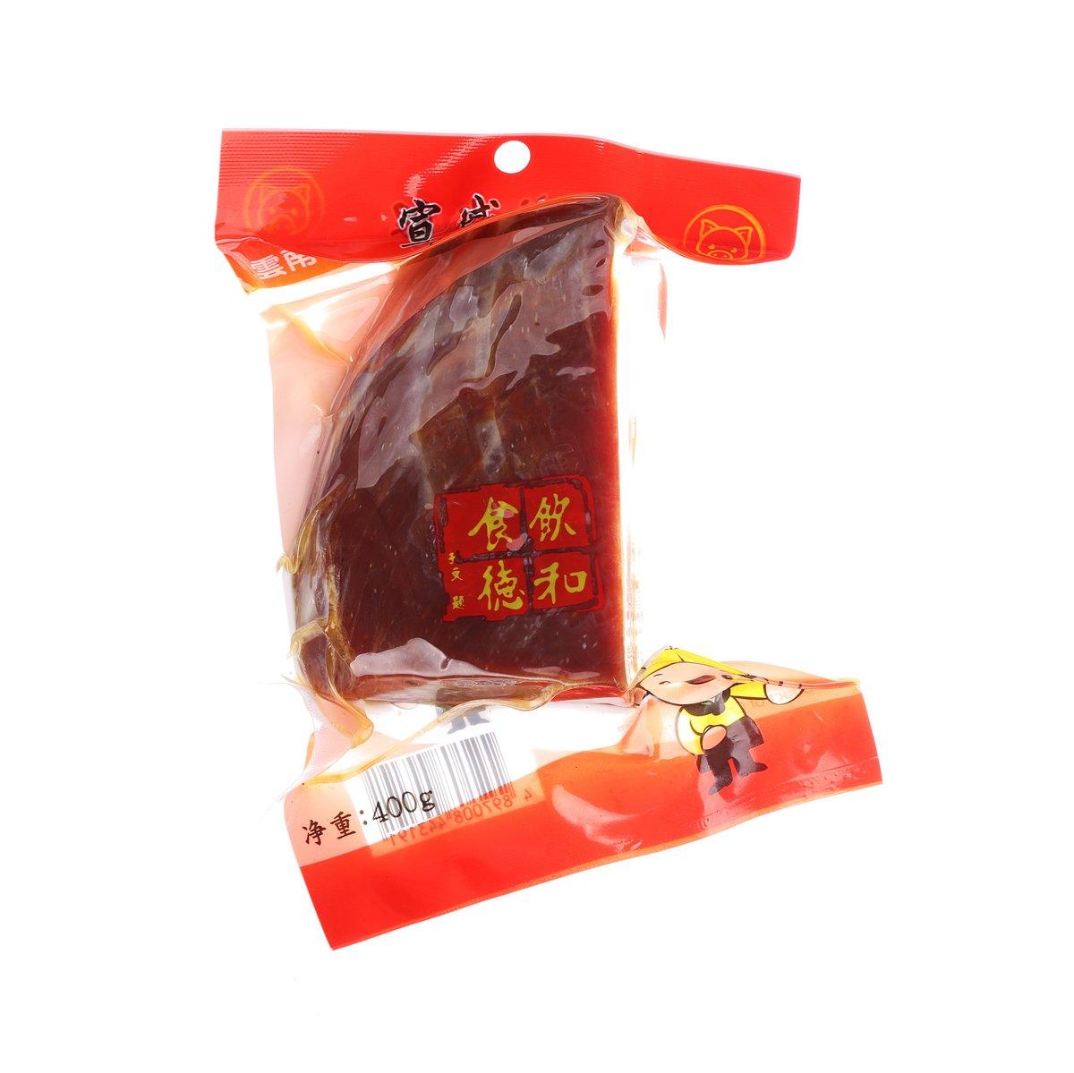 Boneless ham 400g in vacuum bag with sliced dark brown meat