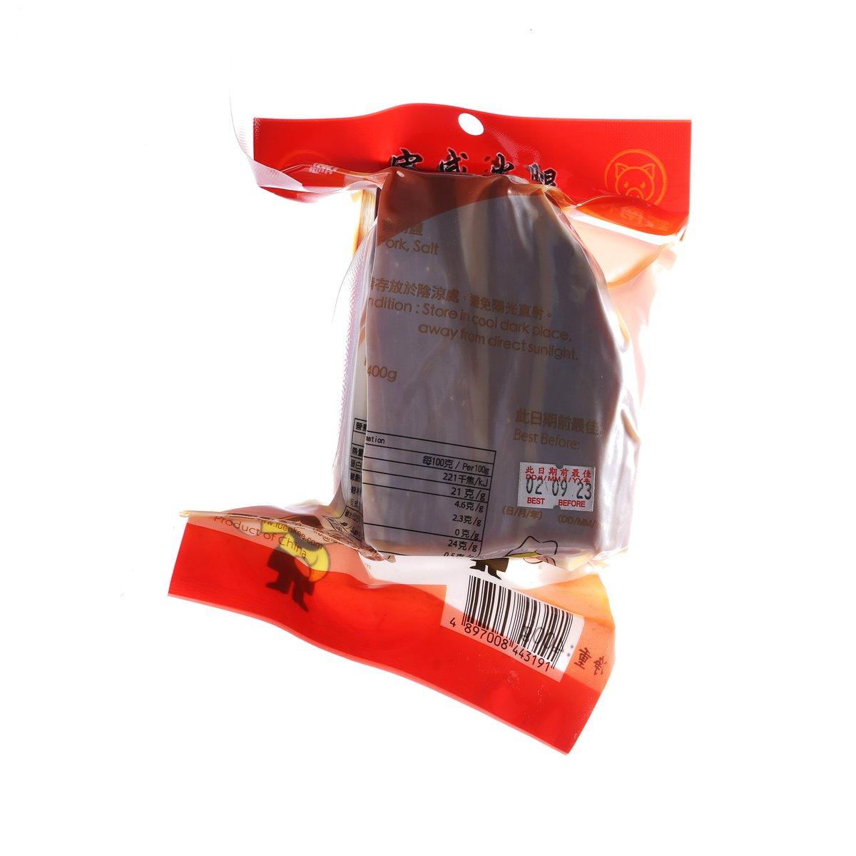 Boneless ham 400g vacuum-sealed bag with dark brown ham and label