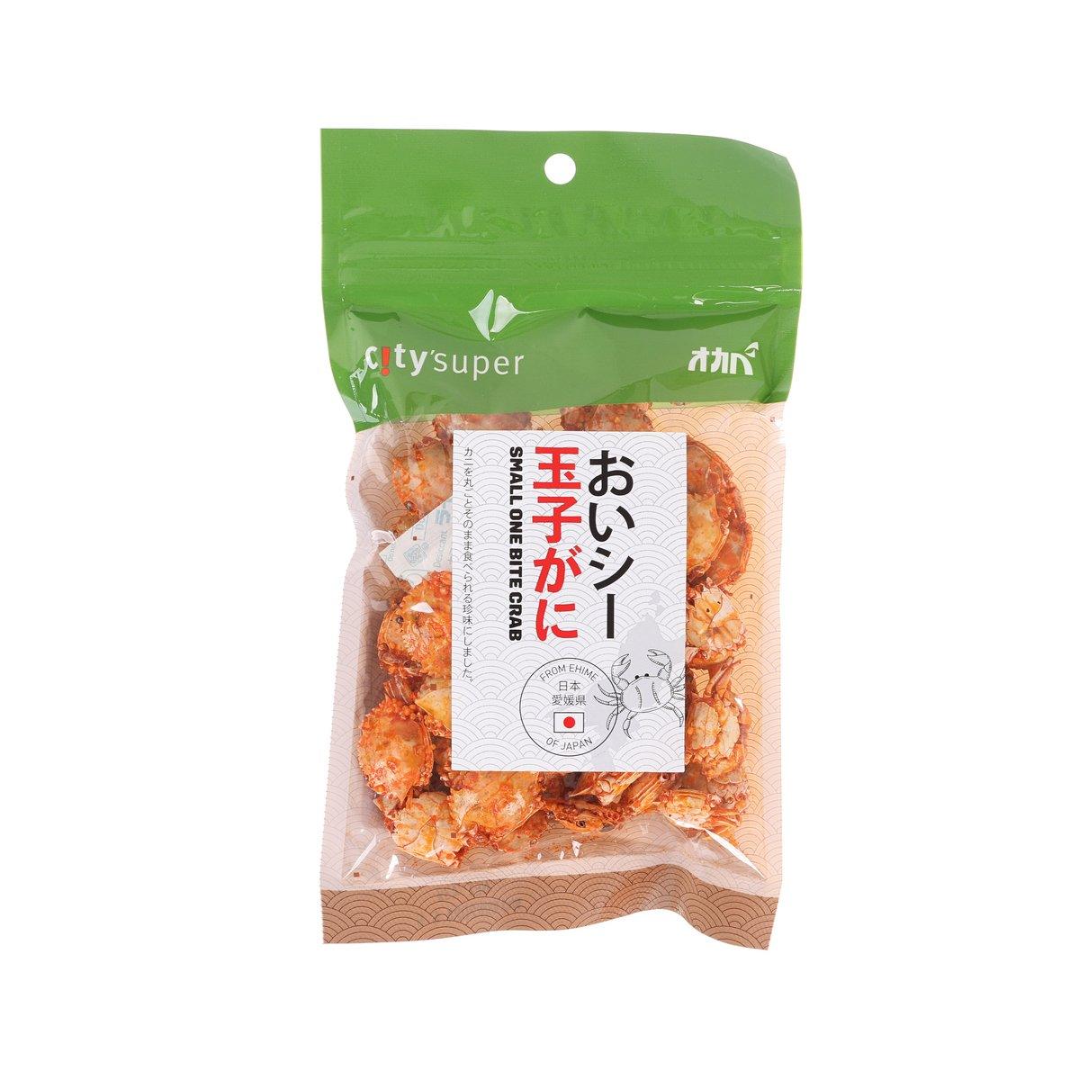 Small one-bite crab snack bag with Japanese label and seasoning pieces inside