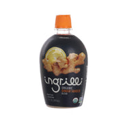Organic ginger squeeze blend bottle with orange cap, dark amber label