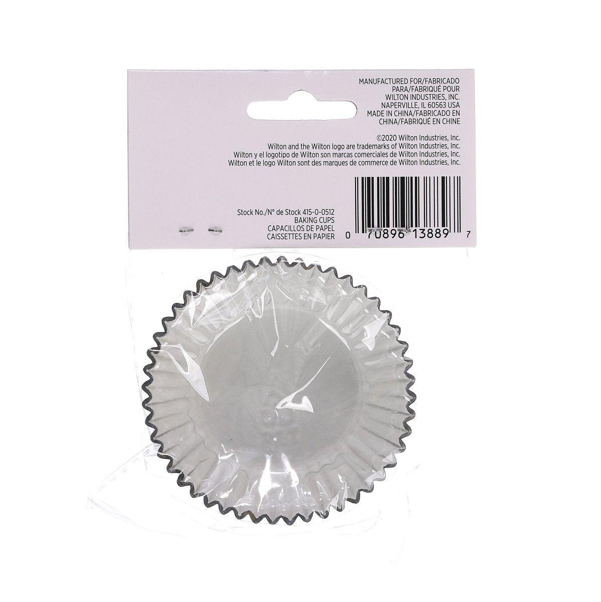 Silver foil baking cup with ruffled edges and spiderweb pattern