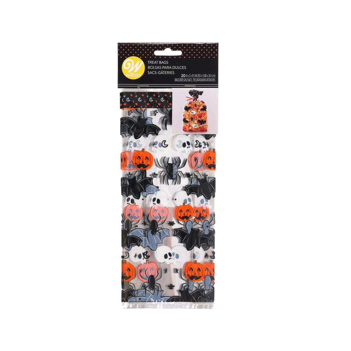 Halloween treat bag with orange pumpkins, ghosts, and bats on black fabric