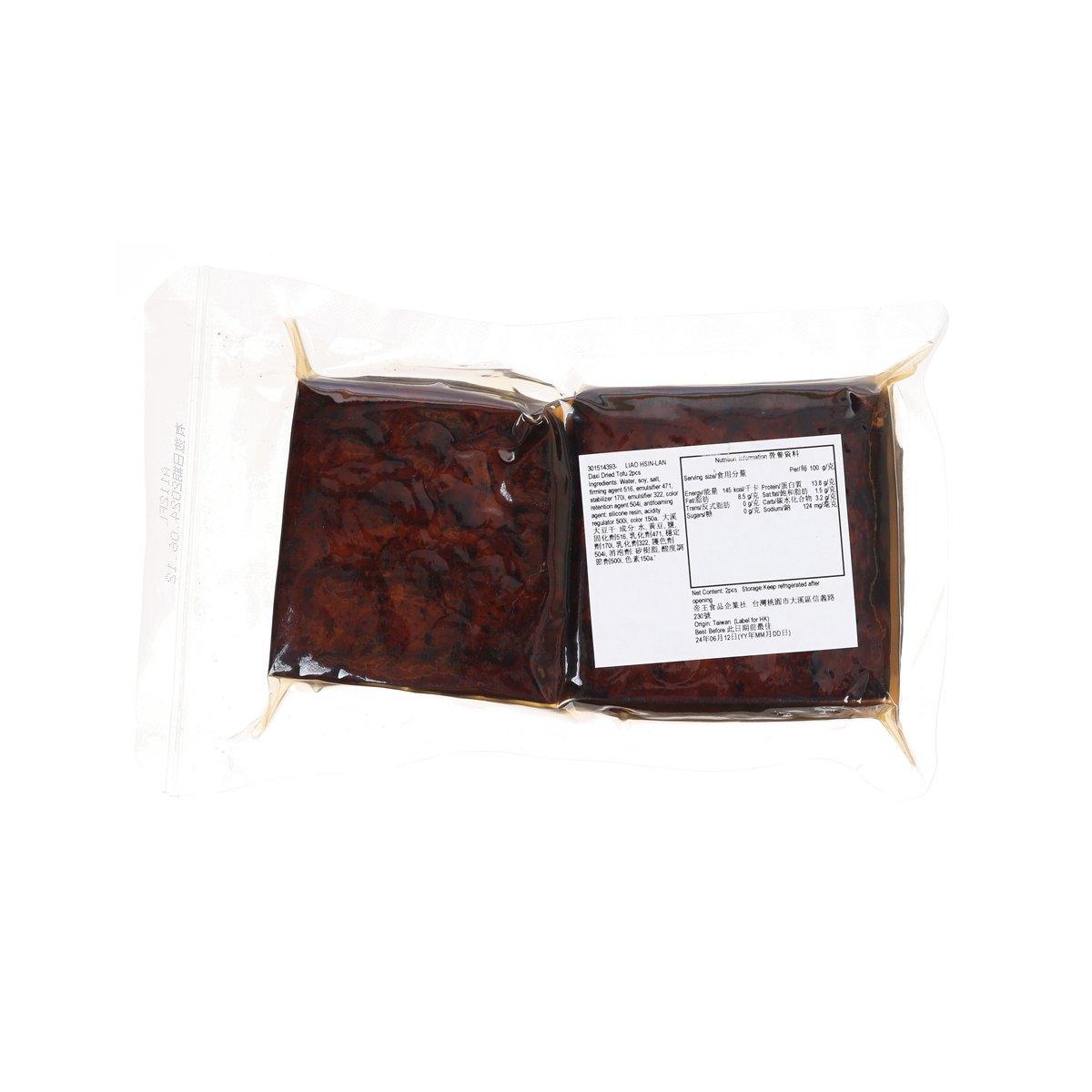 Dried tofu blocks, two vacuum-sealed pieces side by side with white label panel
