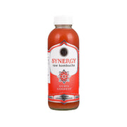 Bottled raw kombucha drink with guava flavor, amber liquid in plastic bottle