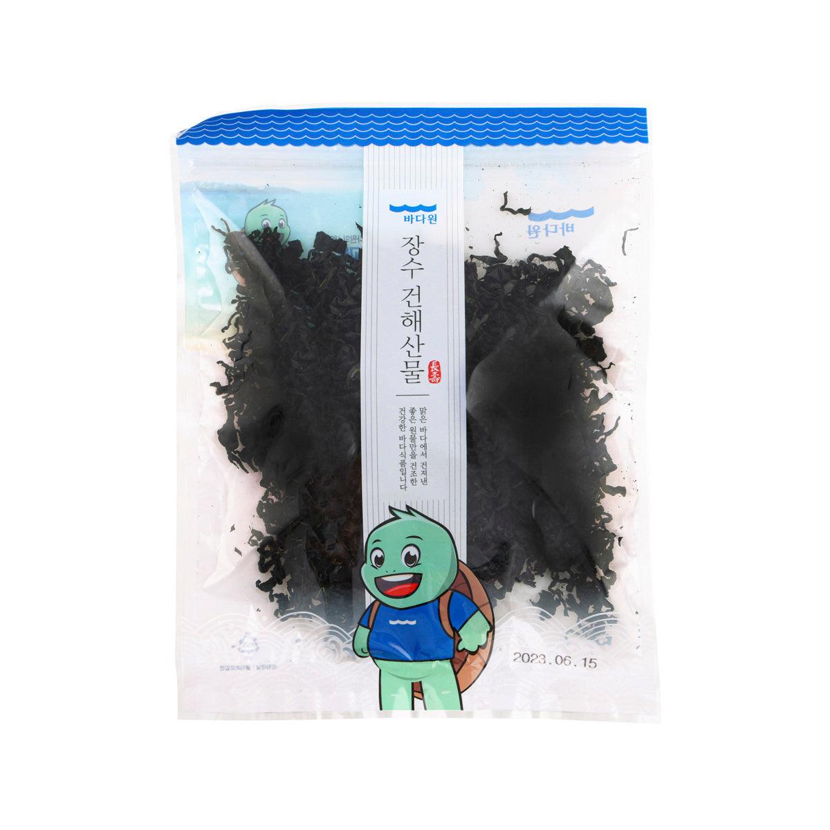Dried seaweed snack in resealable clear bag with black seaweed pieces