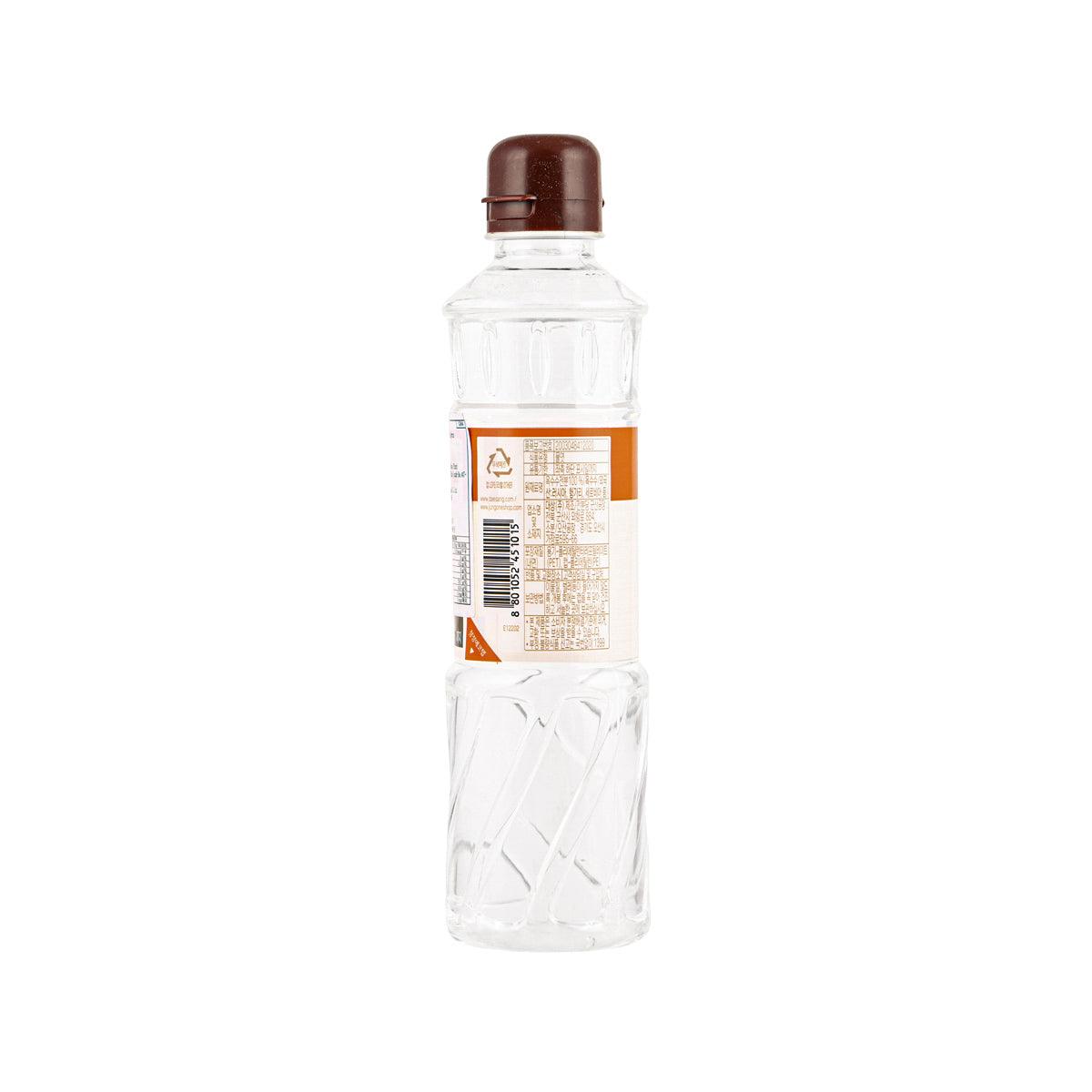 Corn syrup bottle with back label and brown cap, clear plastic container