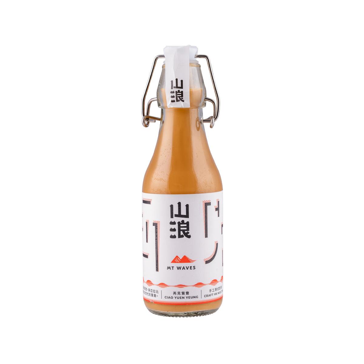 Milk tea bottle drink with swing-top cap, brown bottle, front label visible