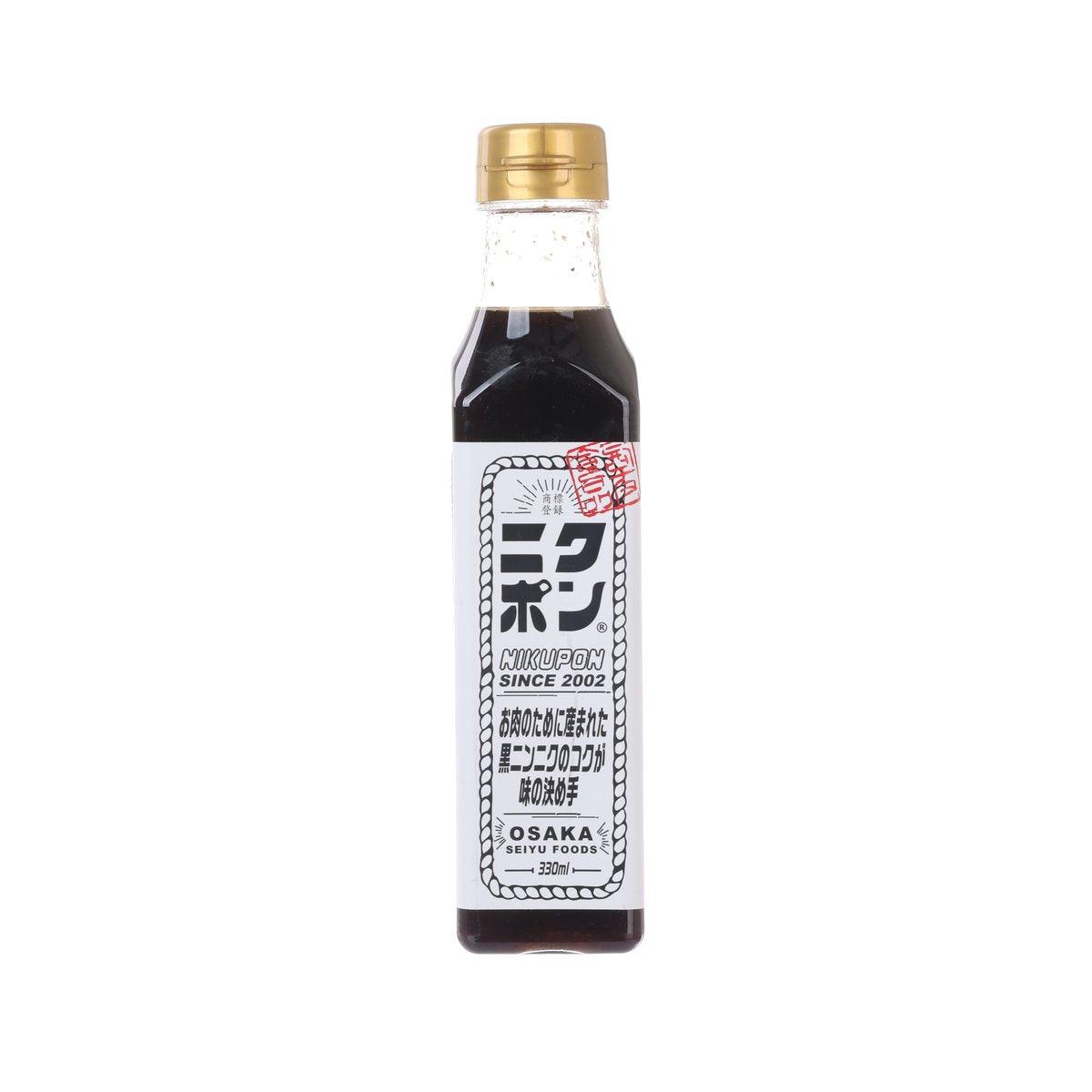 Garlic ponzu citrus vinegar BBQ sauce bottle with gold cap and front label