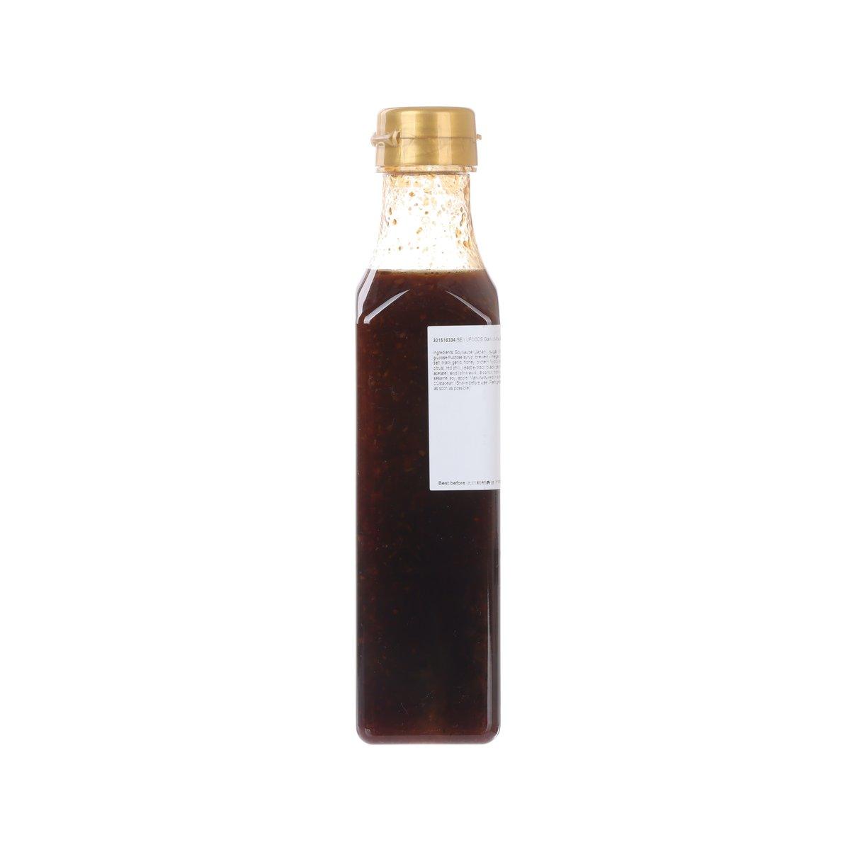 SEIYUFOODS garlic miso BBQ sauce bottle, dark brown, gold cap, side view label