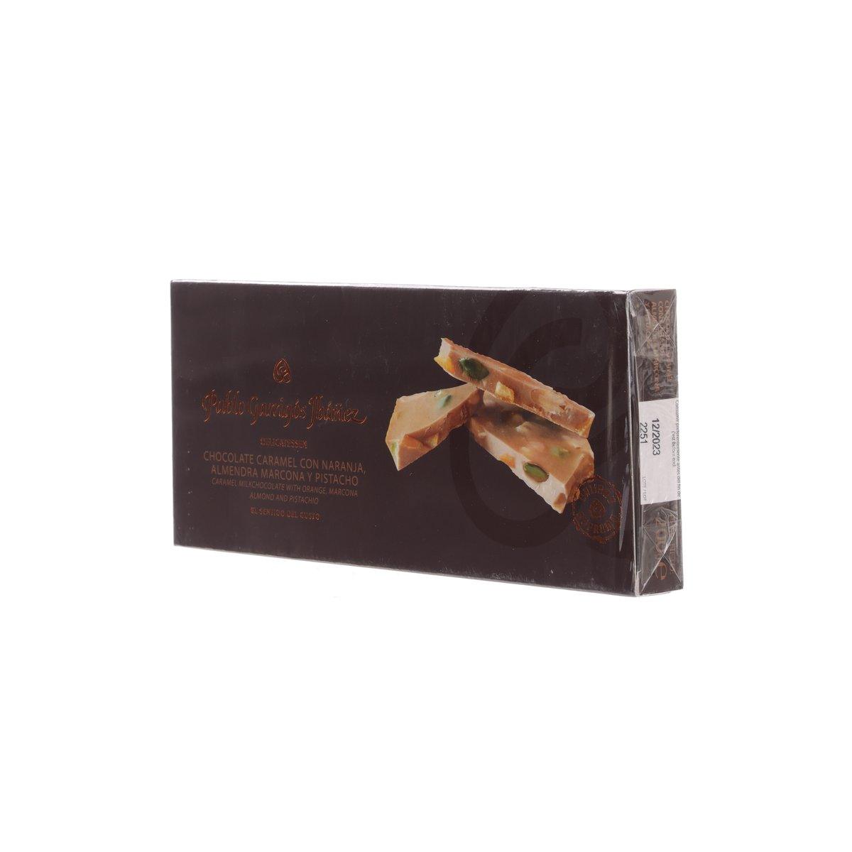 Caramel milk chocolate bar box showing side edge and nut-studded piece artwork