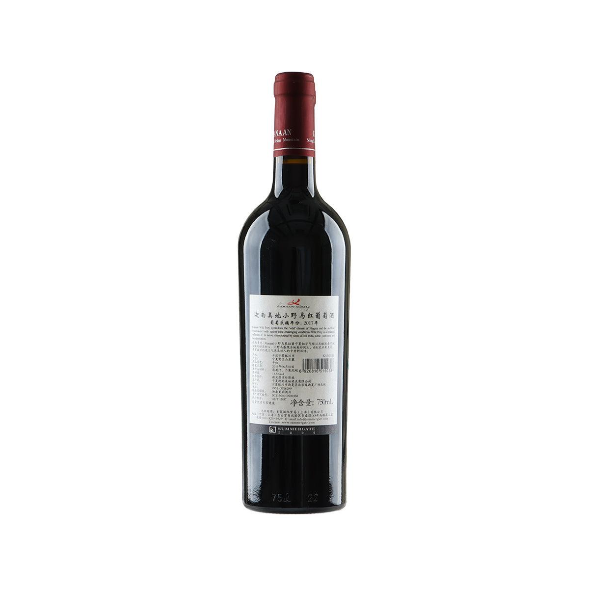 Wine bottle with red foil cap and back label with barcode and tasting text