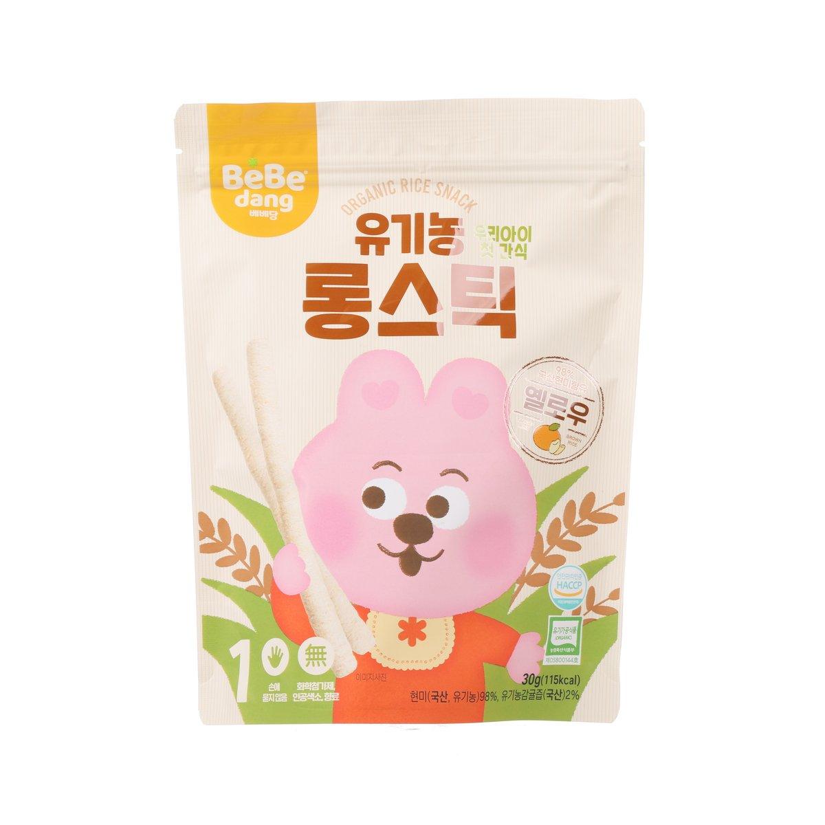Organic brown rice stick snack bag with tangerine orange accents and cartoon dog