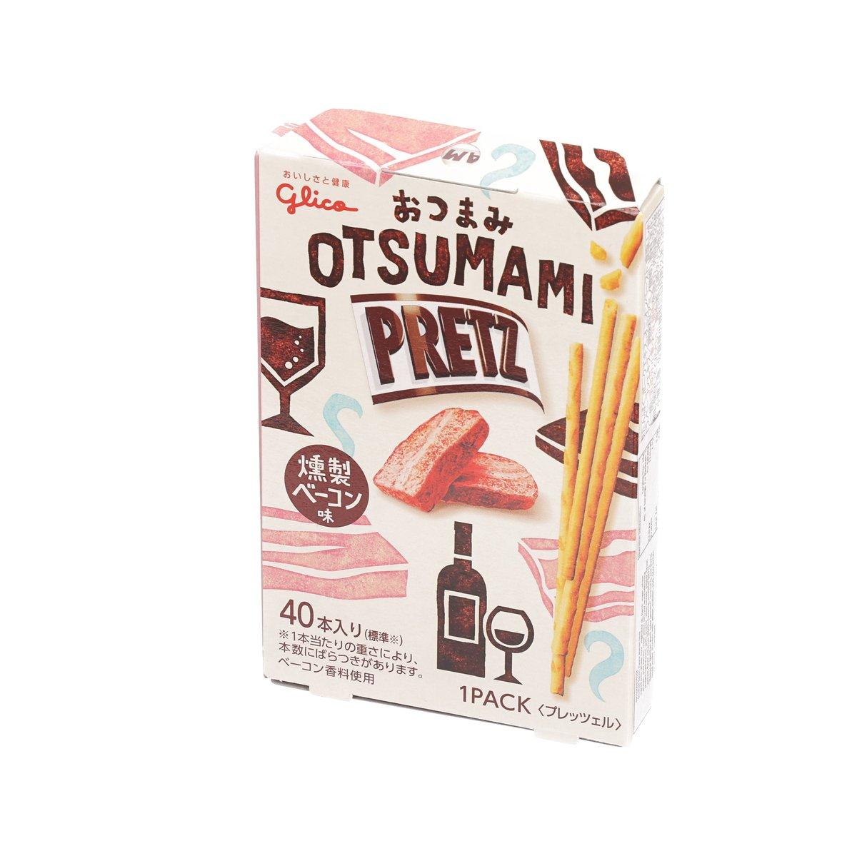 Smoked bacon flavor biscuit stick pack, angled front with bottle and sticks