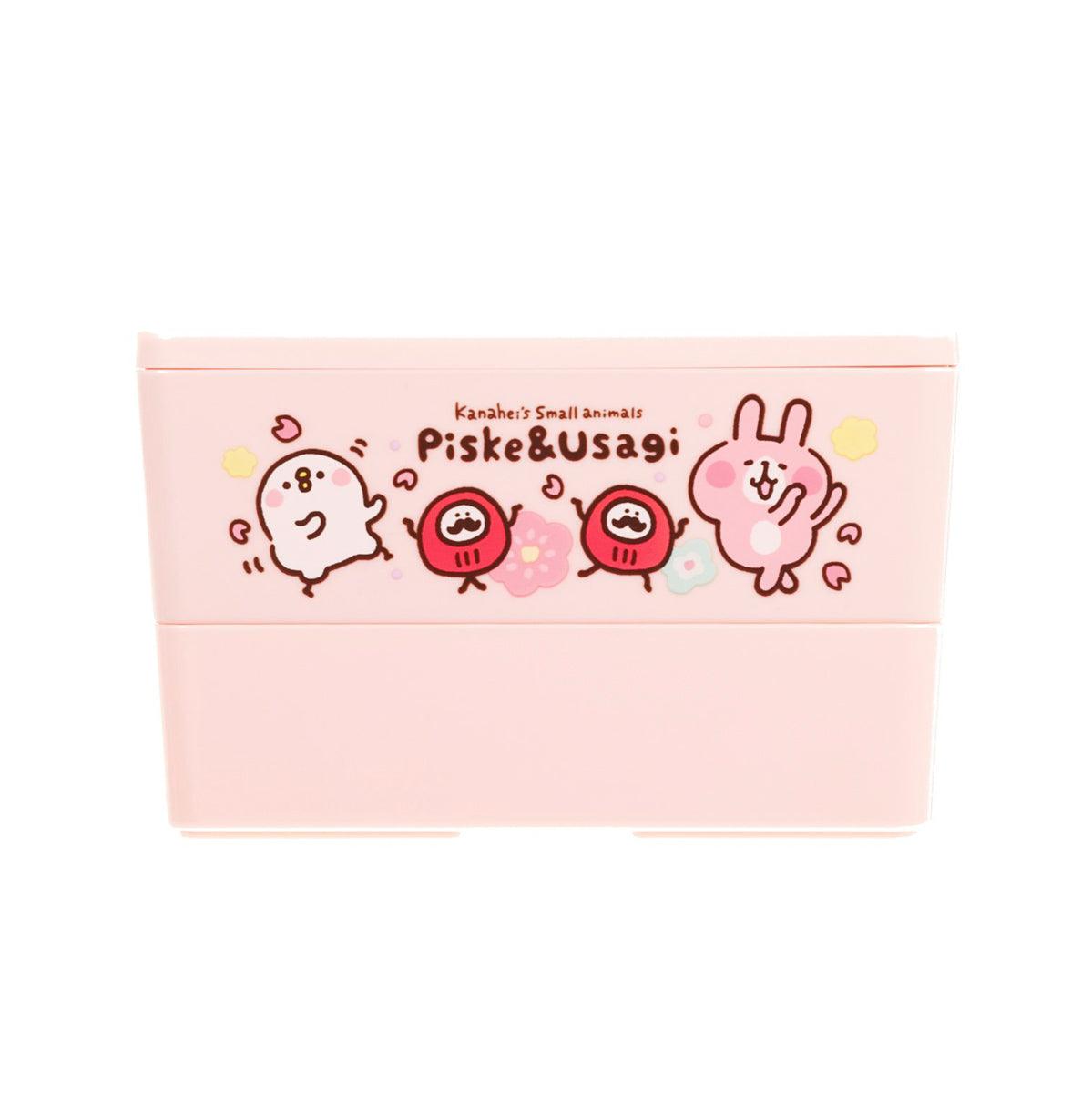 Pink candy box with front panel animal characters and illustrated ribbon