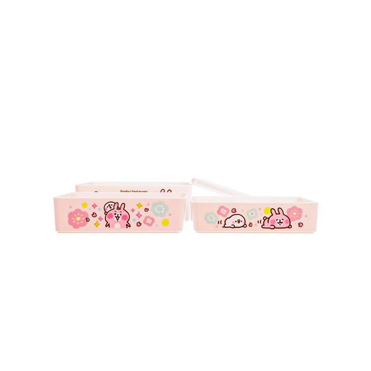 Two-section candy box with open trays and small animals character artwork