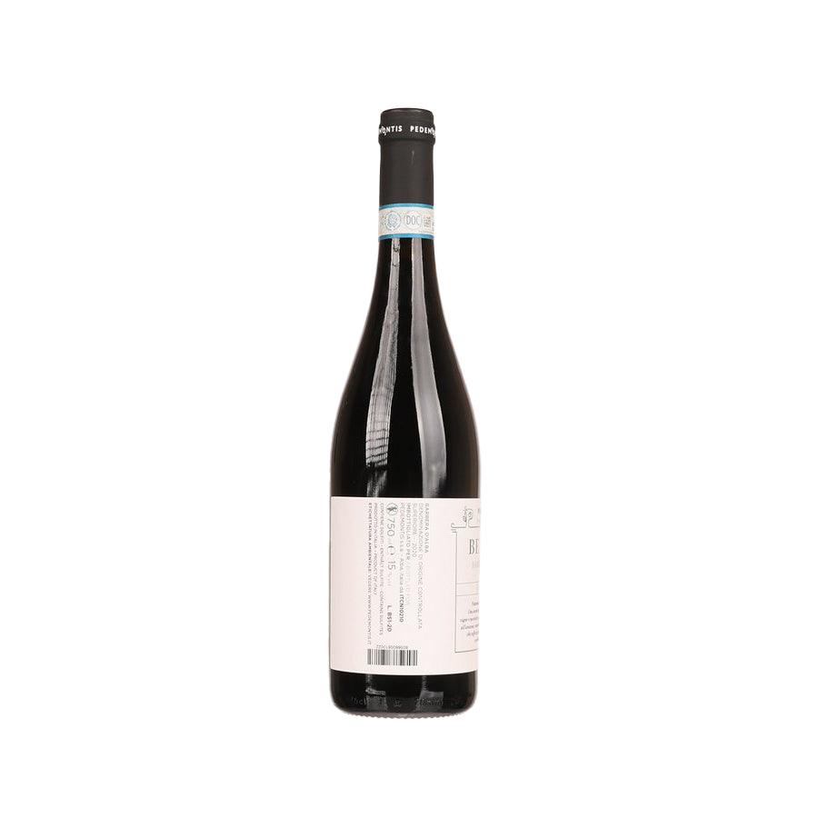 750 mL red wine bottle with side label and black foil cap.