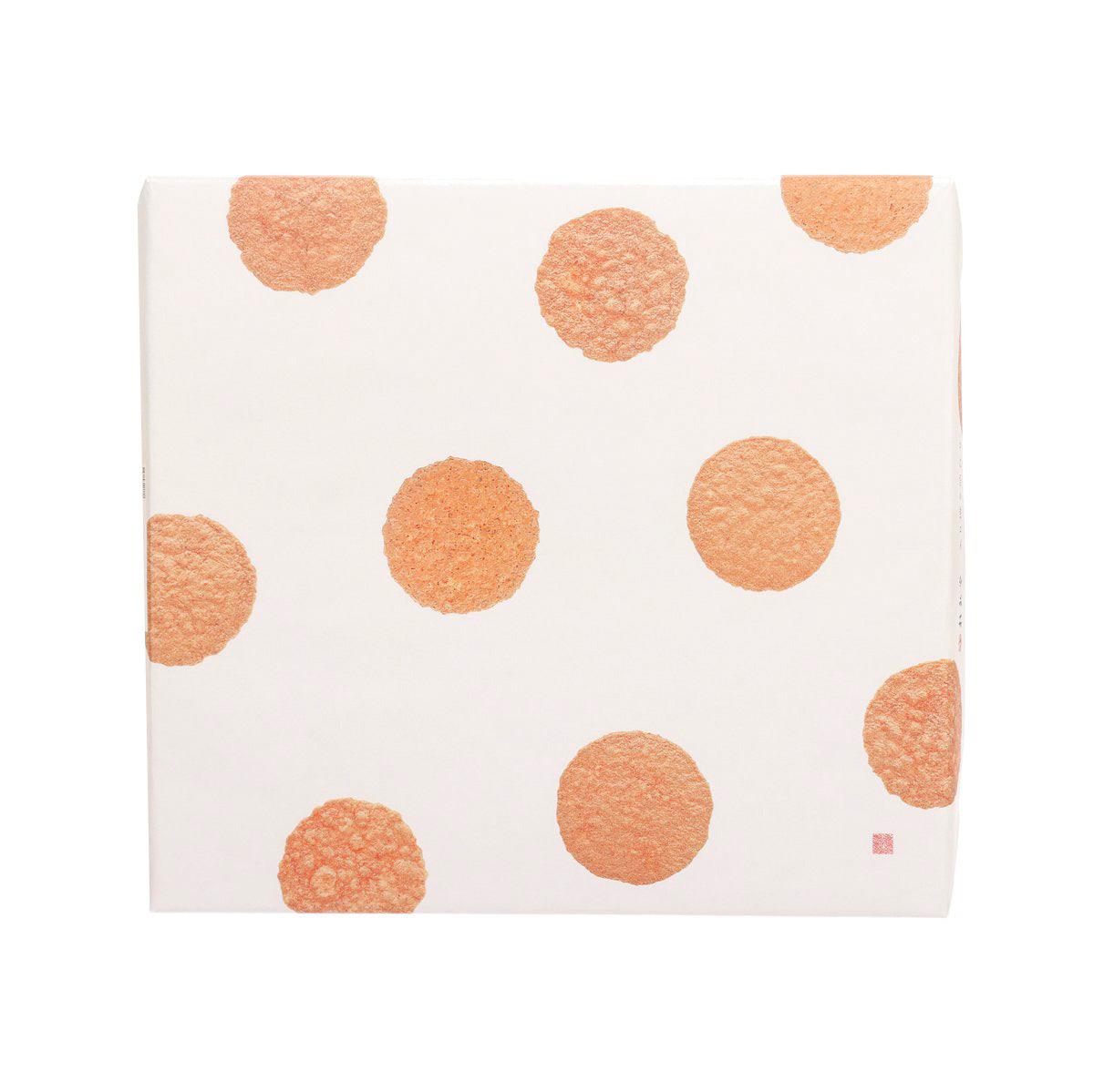 Shrimp cracker assortment box with orange polka-dot pattern on white