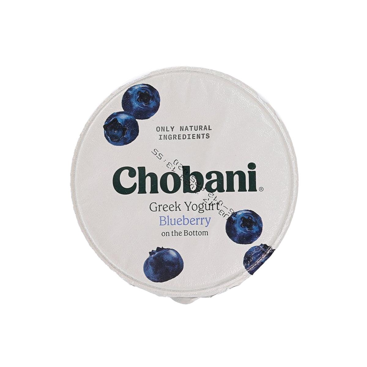 Chobani Greek yogurt blueberry cup, white lid with blueberries and “Greek Yogurt” text