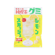Lemon squash gummy snack pouch, bright yellow front with gummy and drink graphics