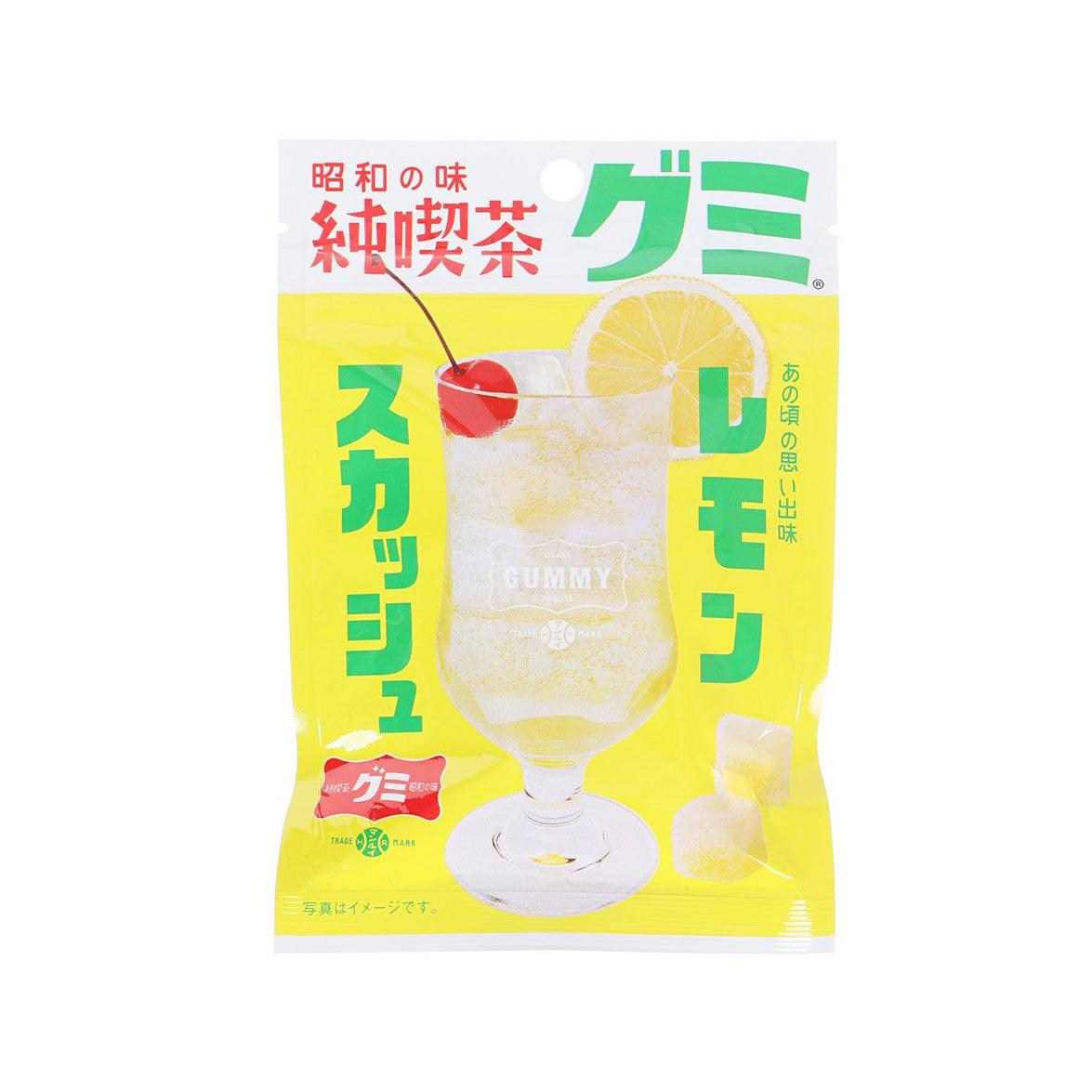Lemon squash gummy snack pouch, bright yellow front with gummy and drink graphics