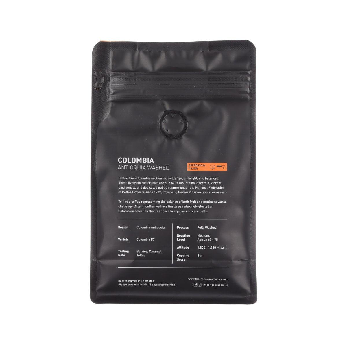 Black coffee pouch back with pull-ring and 'Colombia Antioquia Washed' details