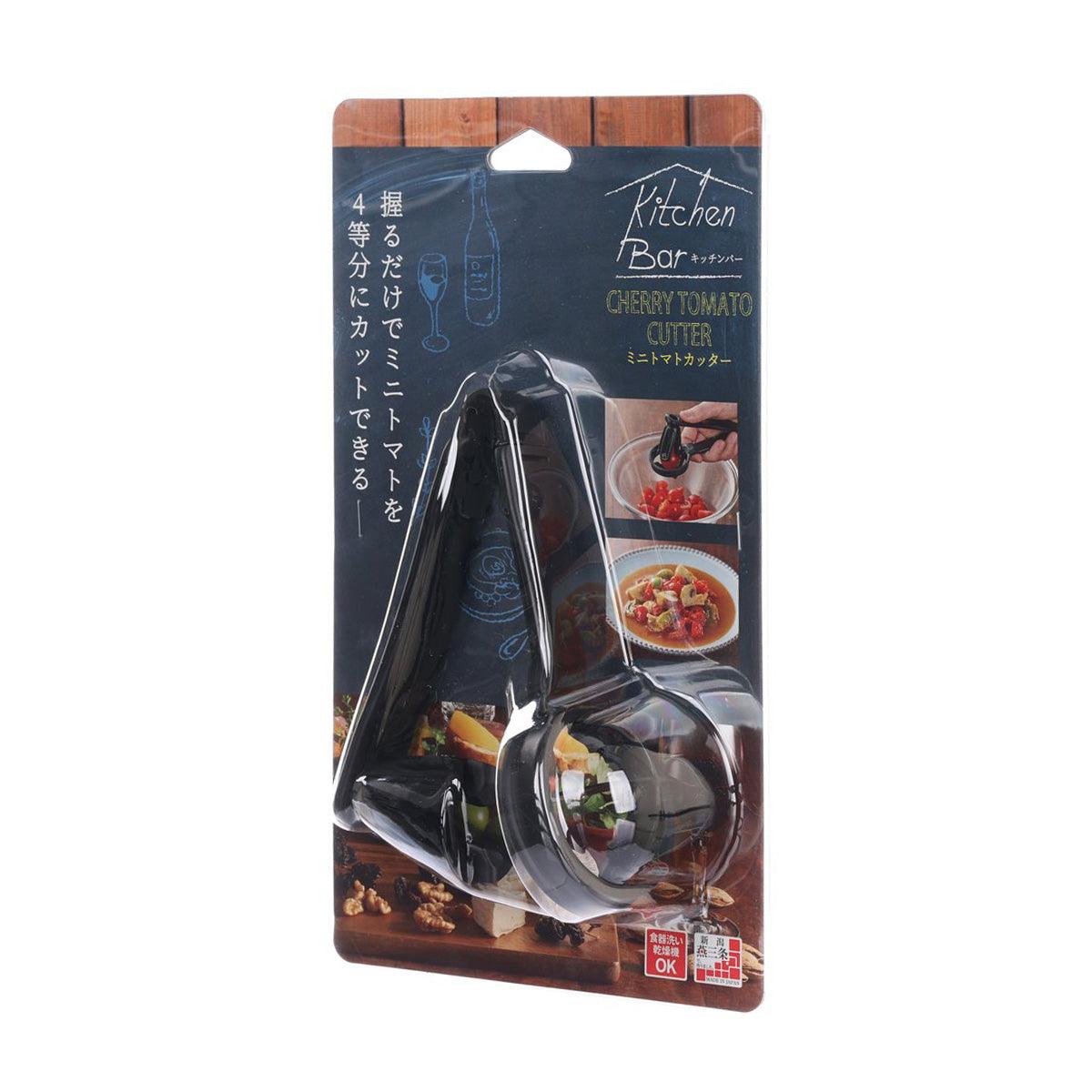 Cherry tomato cutter utensil in blister pack, rounded cup and metal cutting blades