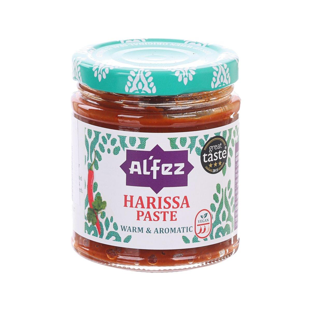 Jar of ALFEZ harissa paste with green lid and red-brown paste