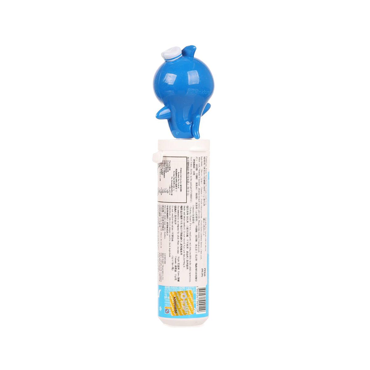 Peach candy tube with blue shark toy topper, barcode and ingredient panel