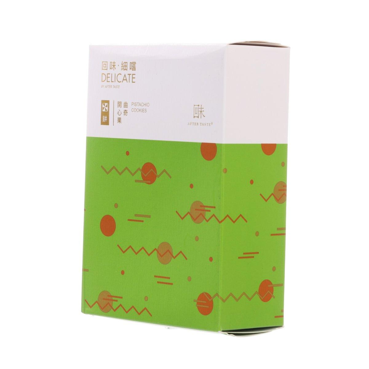 Pistachio cookies packaging box, white top and green front panel with cookie icons