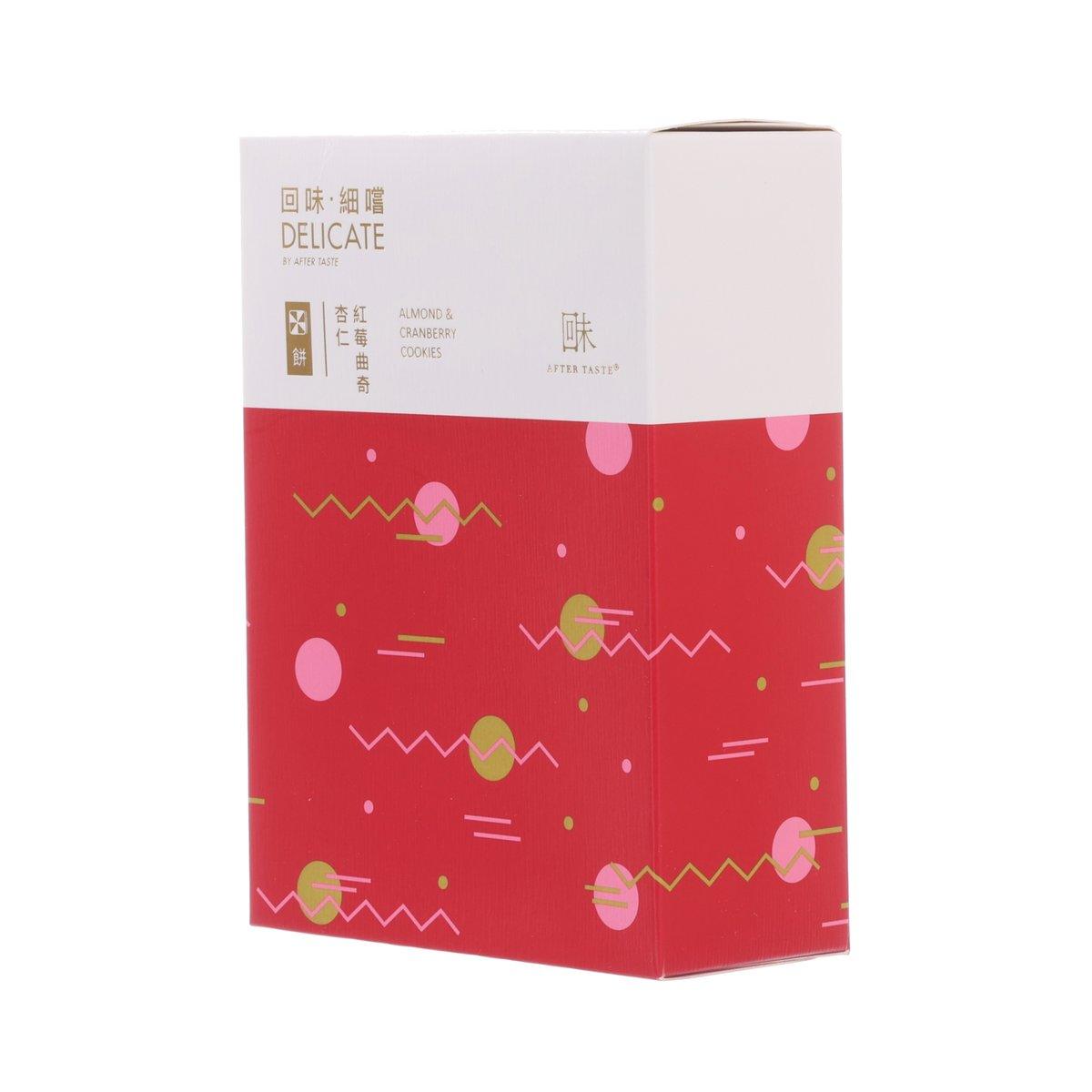 Red and white cookie gift box shown from the side with decorative pattern and logo