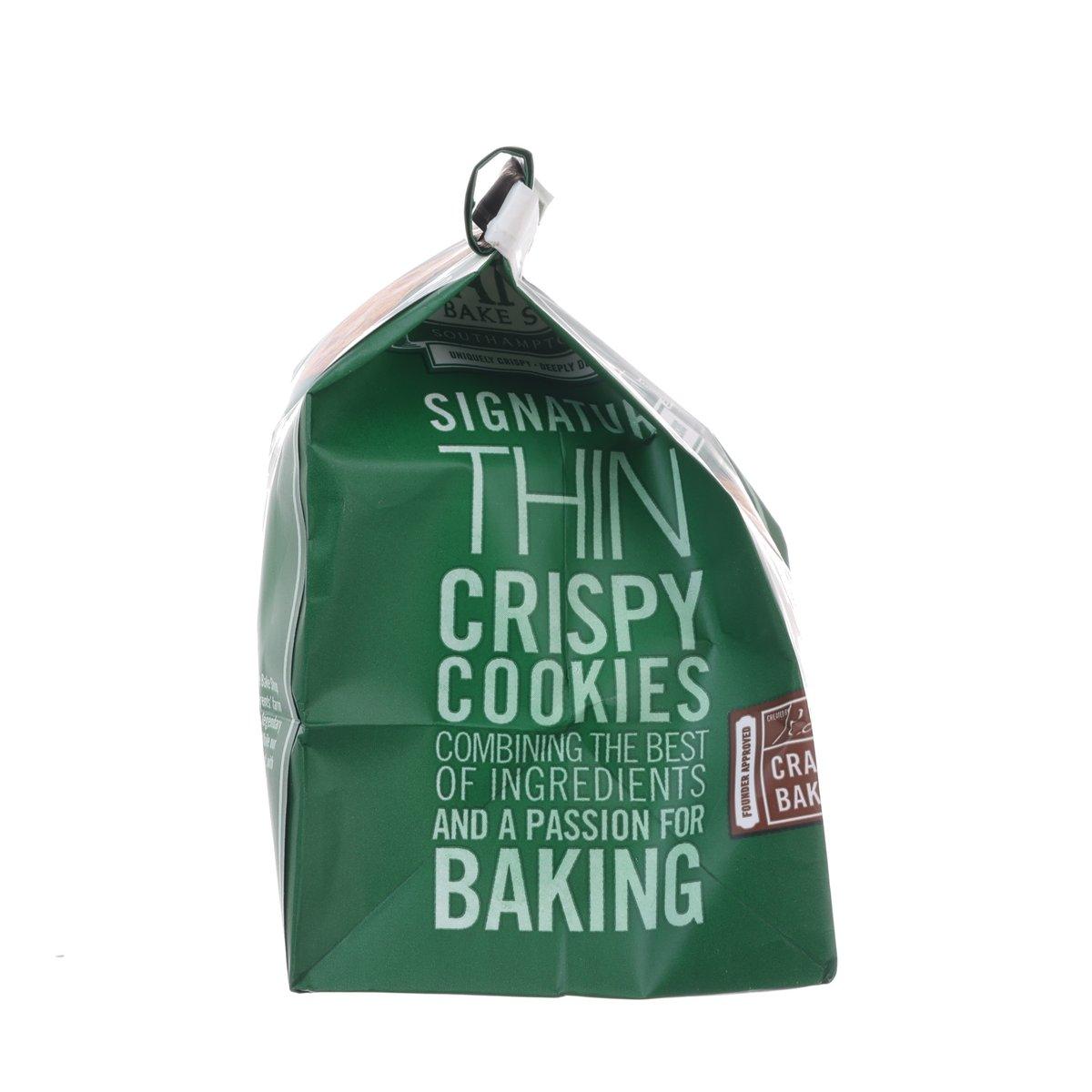 Green TATE'S cookie bag side with thin and crispy cookies baking slogan