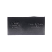 Dark chocolate bar box with FLORENT THEVENON logo and caramelized Piemonte hazelnuts text