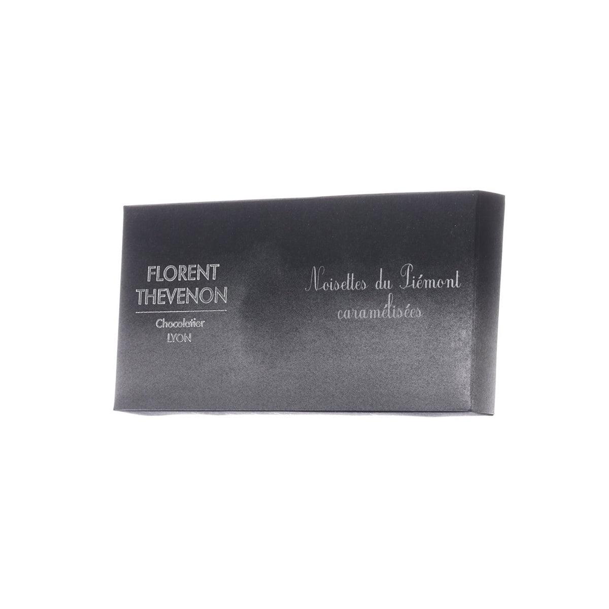 Dark chocolate bar box front with FLORENT THEVENON and caramelized Piemonte hazelnuts