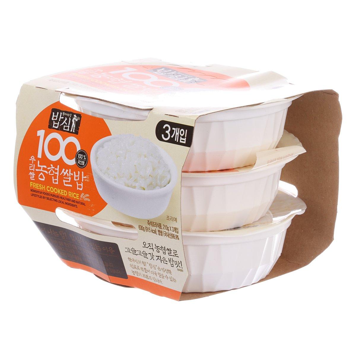 Instant cooked rice 3-pack with stacked white cups and orange front packaging