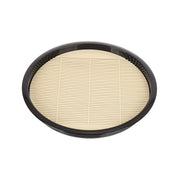 Round metal noodle plate with black rim and ribbed beige interior