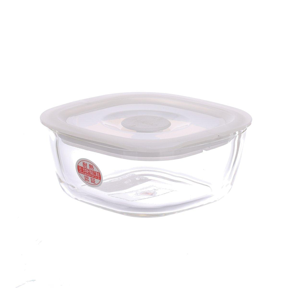 Round clear airtight food container with gray lid, side view