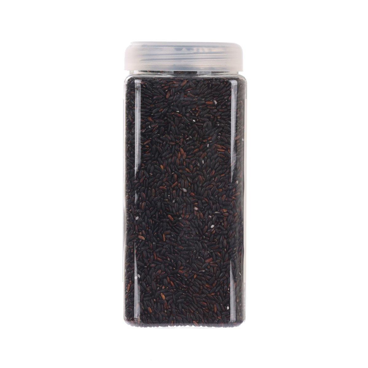 Organic black rice jar filled with dark grains, 1 kg