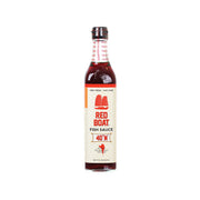 Red Boat 40°N fish sauce bottle, dark amber glass with red cap and front label