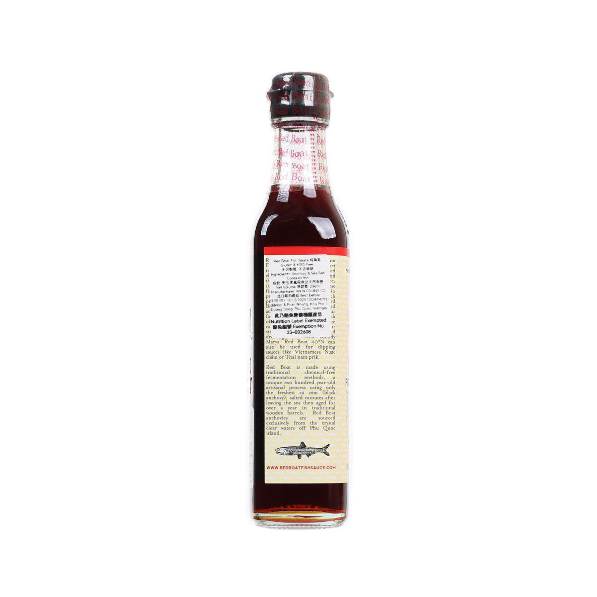 Fish sauce bottle with back label, pale text panel with ingredients