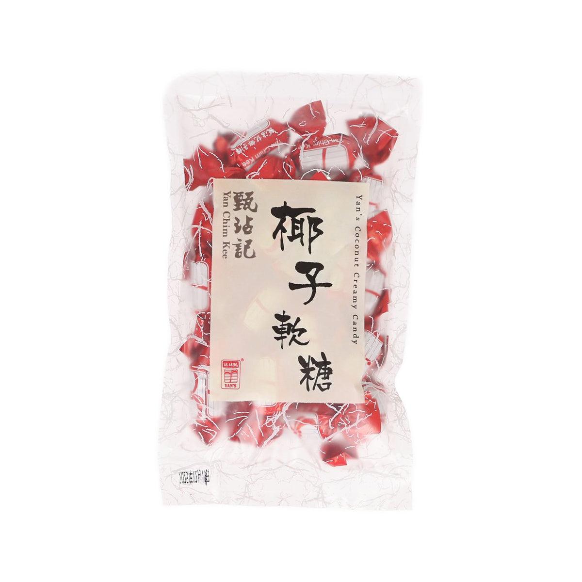 Coconut creamy candy bag, red foil pieces visible through clear wrapper