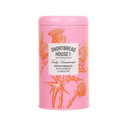 Pink shortbread tin with orange flower graphics and Spanish clementine label