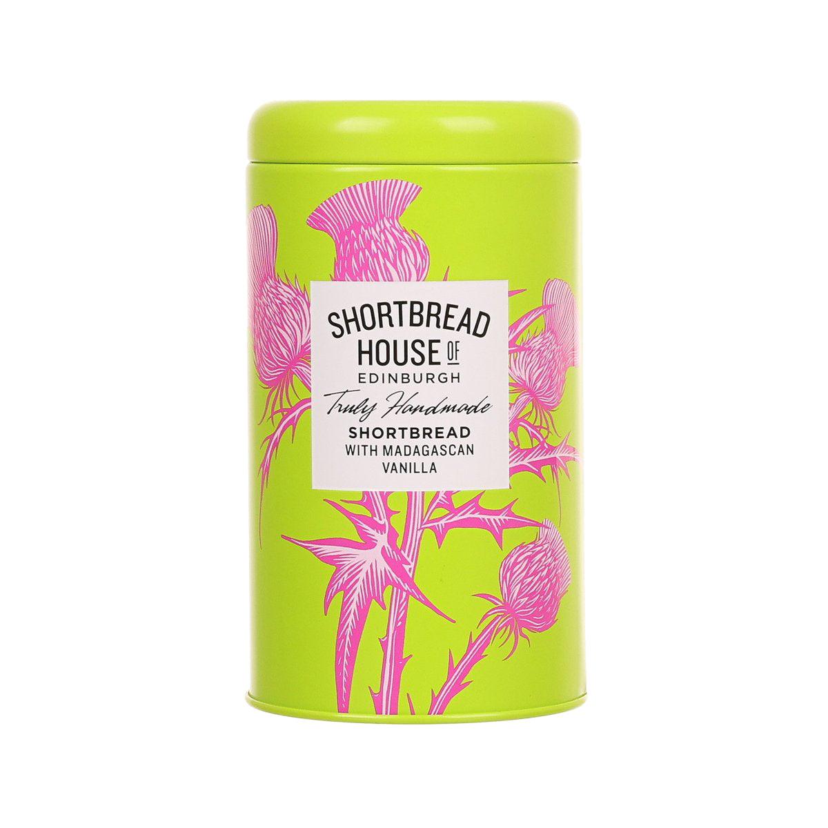 Shortbread vanilla tin with pink tropical flower label, green cylindrical container