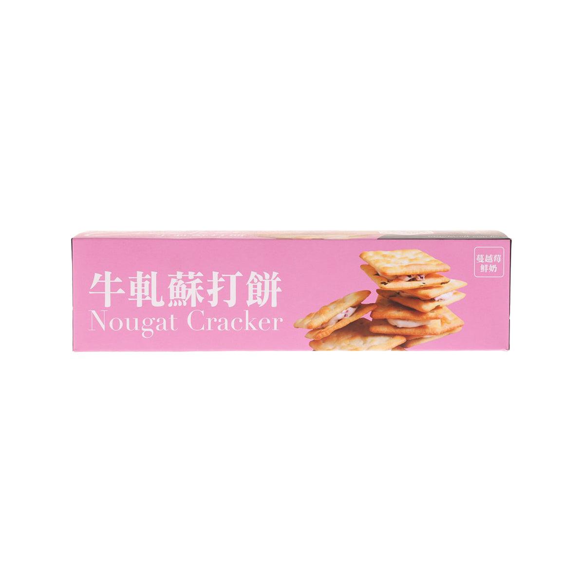 Nougat cracker box front panel, pink with 'Nougat Cracker' text and product photo