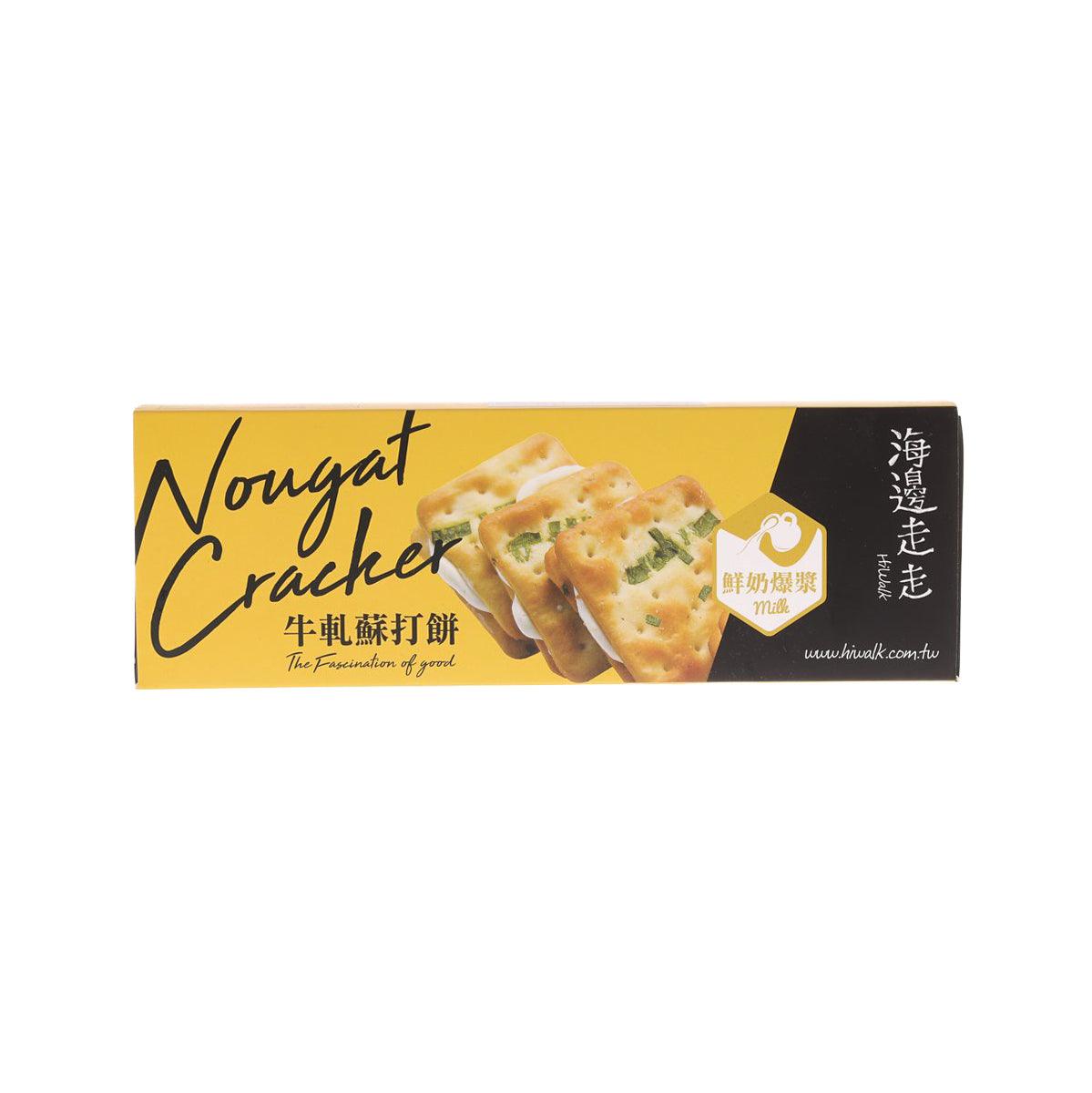 Milk nougat cracker box with illustrated crackers on yellow and black packaging