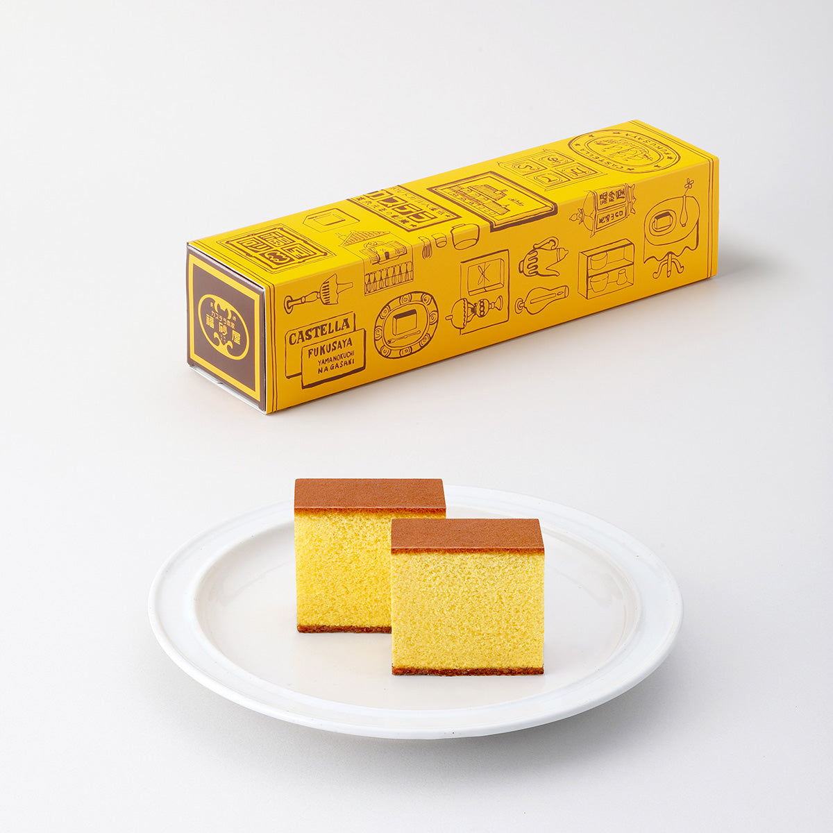 FUKUSAYA Castella cake set: yellow sponge squares, shown on white plate