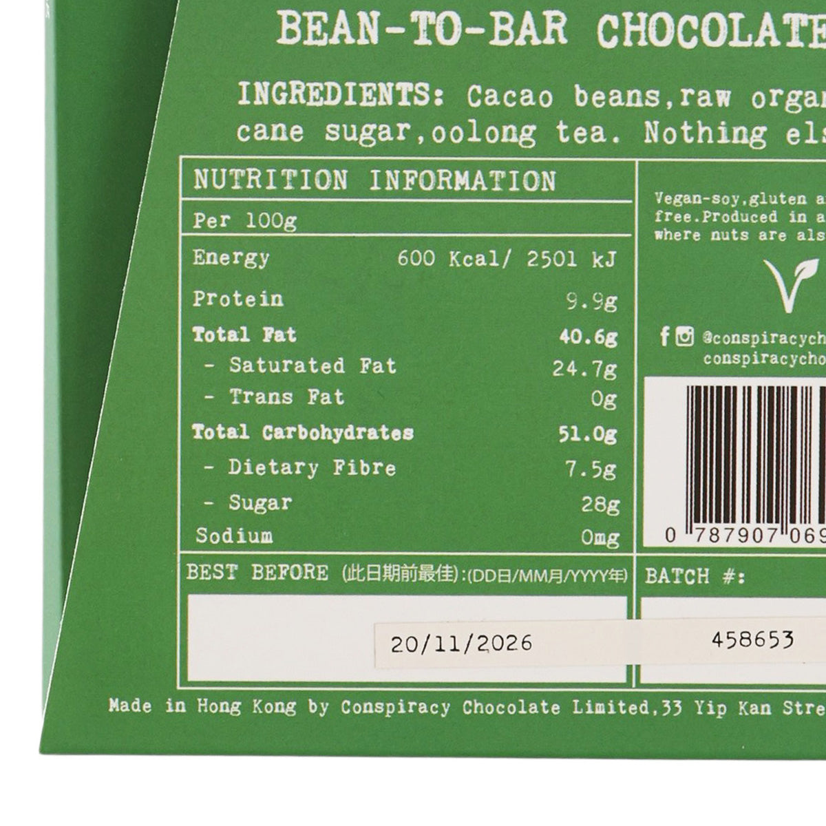 Chocolate bar wrapper close-up of nutrition panel and barcode, green
