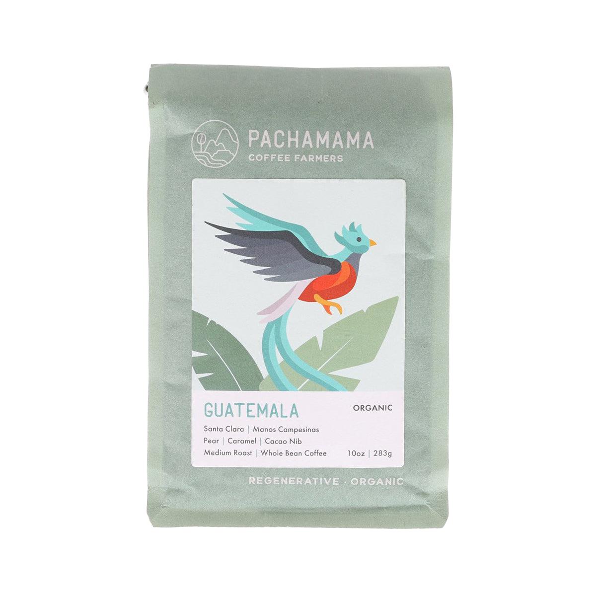 Mint green coffee bag with PACHAMAMA logo and bird illustration for organic whole beans